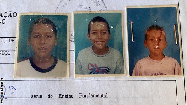 Firmino's school registration form with three photos of him as a child