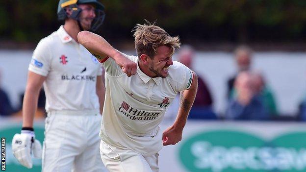 Lancashire's Tom Bailey celebrates a wicket