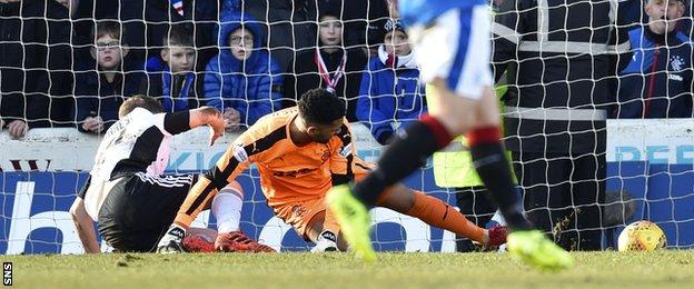 Ayr's Alan Forrest deflects the ball past Rangers' Wes Foderingham