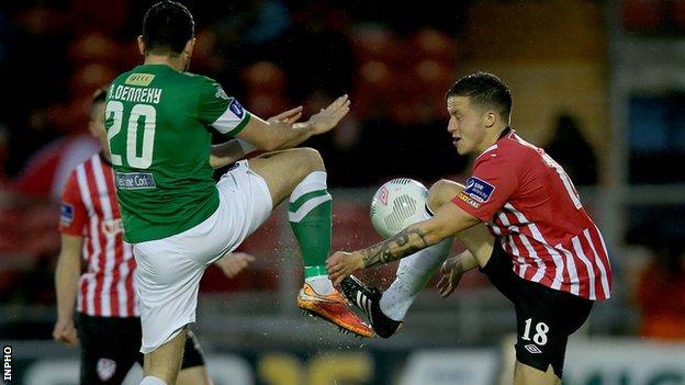 Cork midfielder Billy Dennehy challenges Derry's Rob Cornwall