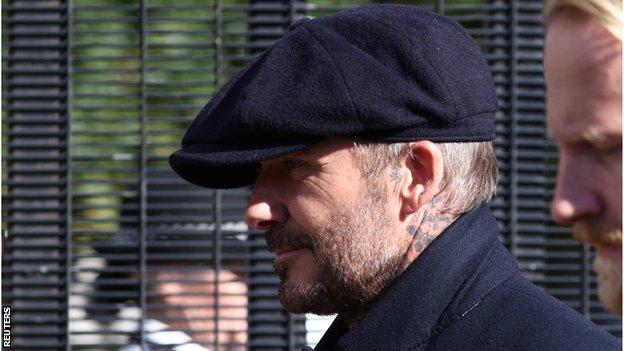 David Beckham leaves Westminster Hall after paying tribute to the Queen