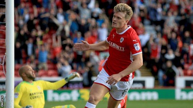 Cameron McGeehan celebrates scoring for Barnsley against Middlesbrough