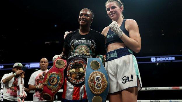 Savannah Marshall poises with Claressa Shields