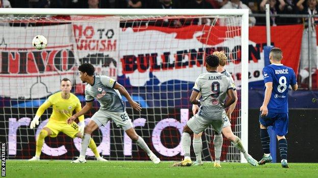 Mateo Kovacic of Chelsea scores against Red Bull Salzburg in the Champions League