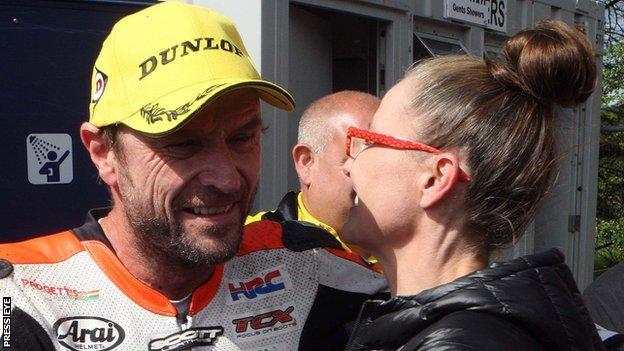 Bruce Anstey celebrates a victory in the 2017 Ulster Grand Prix with his wife Annie
