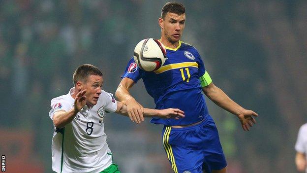 Edin Dzeko battles with James McCarthy in Friday's game in Zenica