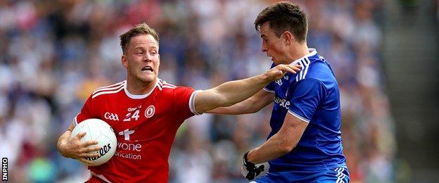 Kieran McGeary battles with Monaghan's Shane Carey in the All-Ireland semi-final earlier this month