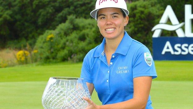 Isabelle Boineau celebrates with the Scottish Open trophy