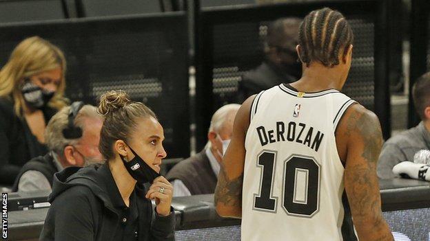 San Antonio Spurs assistant coach Becky Hammon directs DeMar DeRozan against the Los Angeles Lakers