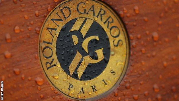 The French Open logo in the rain