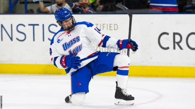 Ben Meehan celebrates scoring a goal for the UMass-Lowell River Hawks