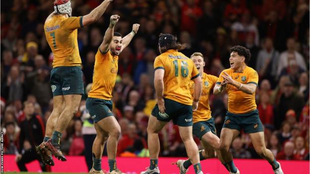 Australia's players celebrate at full time