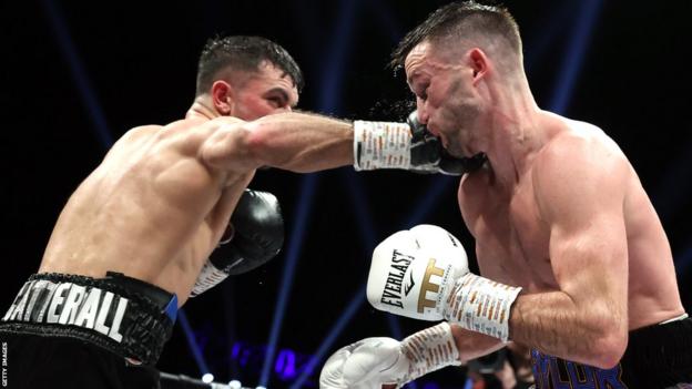 Jack Catterall punhes Josh Taylor