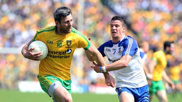 Donegal's Christy Toye shrugs off the attention of Monaghan's Ryan Wylie at Clones