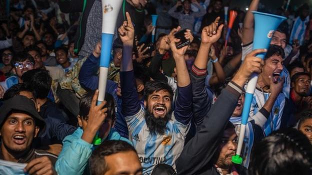 Argentina fans celebrate their team's victory in the semi-final match against Croatia in Dhaka