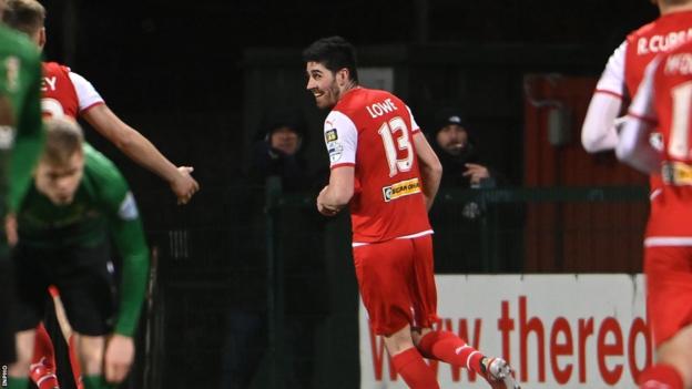 Kris Lowe celebrates scoring the goal which secured victory for Cliftonville