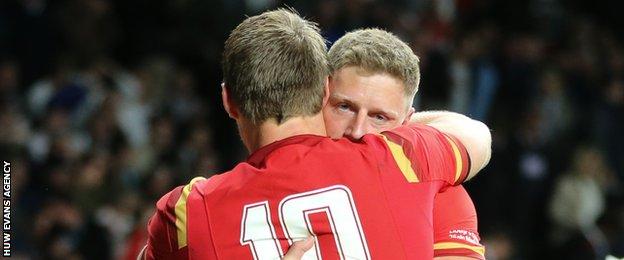 Rhys Priestland and Dan Biggar celebrate Wales' World Cup win over England