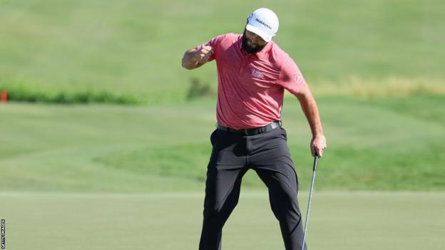 Jon Rahm celebrates