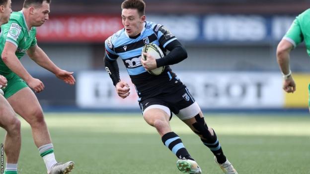 Cardiff's Josh Adams makes a break