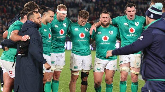 The Ireland players show their dejection after Saturday's defeat at Eden Park