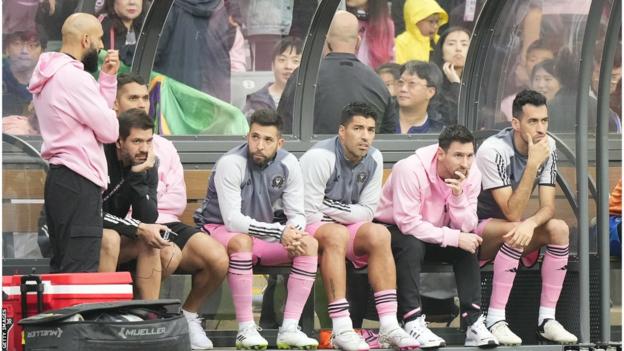 Lionel Messi sat on the substitutes' bench