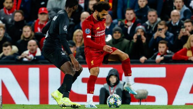 RB Salzburg's Patson Daka (left) up against Liverpool's Mohamed Salah