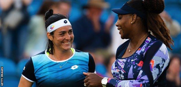 Ons Jabeur and Serena Williams in action in the women's doubles at the Eastbourne International