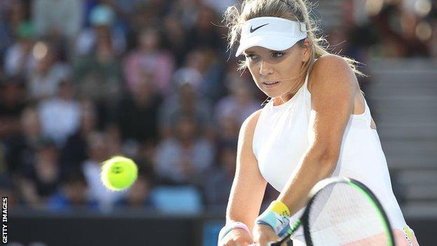 Katie Boulter returns a ball at the Australian Open in January