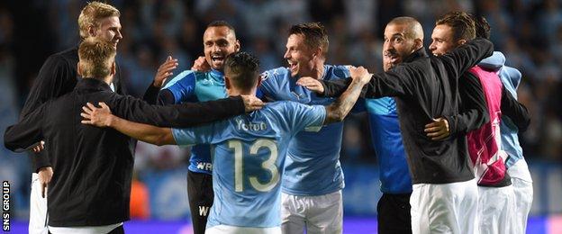 Malmo players celebrate their 2-0 win over Celtic