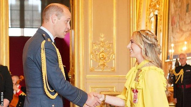 Laura Kenny received her damehood from the Duke of Cambridge at Windsor Castle