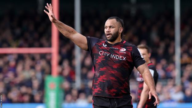 Billy Vunipola gestures while playing for Saracens