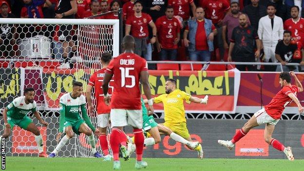 Al Ahly's Taher Mohamed (far right) nets the equalising goal in the 90th minute