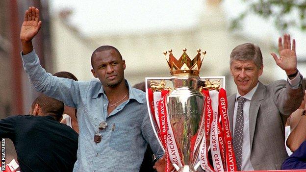 Patrick Vieira and Arsene Wenger celebrate Arsenal's title success in 2004