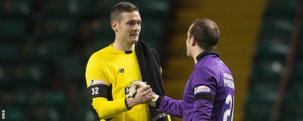 Celtic's Craig Gordon shakes hands with Kilmarnock's Jamie MacDonald