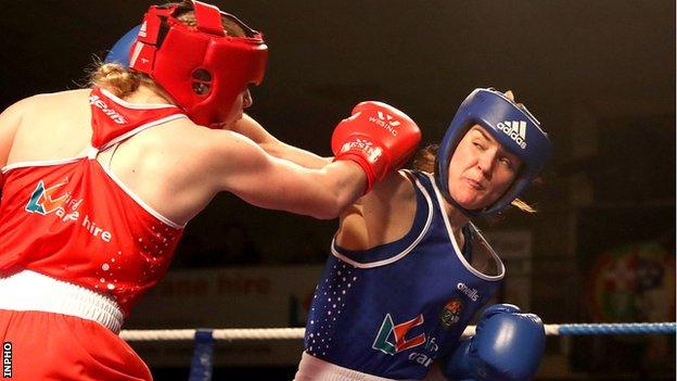 Harrington (in blue) beat Amy Broadhurst to win the Irish lightweight title in February