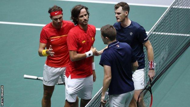 Jamie Murray and Neal Skupski shake hands with Rafael Nadal and Feliciano Lopez