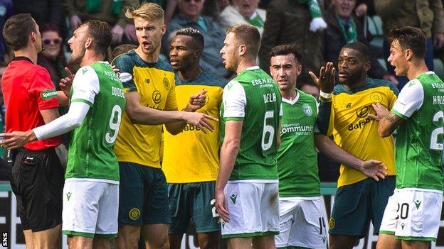 Hibs and Celtic players appeal to the referee