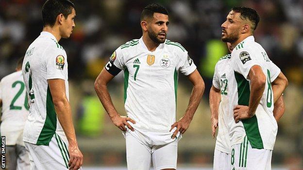 Algeria players react after Equatorial Guinea score