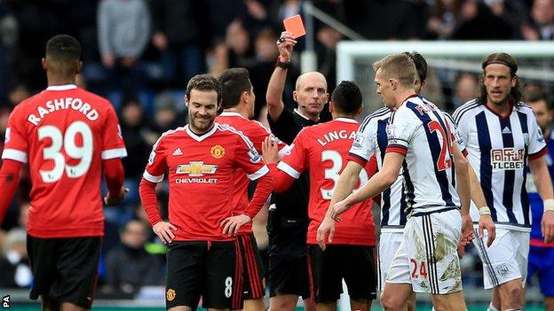 Mata is shown a red card