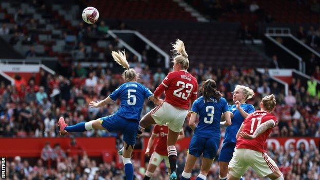 Alessia Russo heads Manchester United's equaliser against Everton at Old Trafford in the Women's Super League