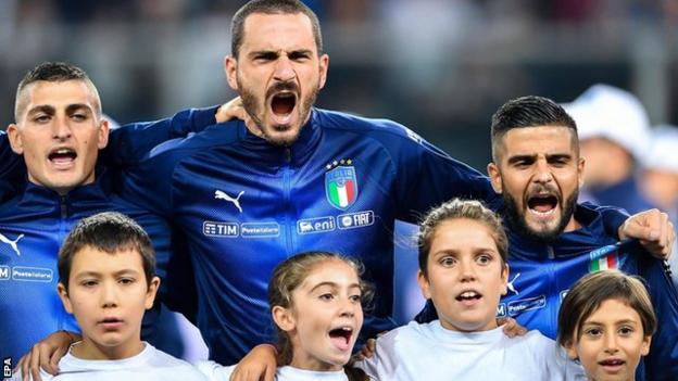 Italy's Leonardo Bonucci singing the national anthem before kick-off