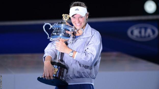 Caroline Wozniacki holding the Australian Open trophy