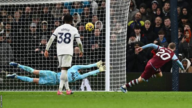 Jarrod Bowen smashes the ball into the Tottenham net