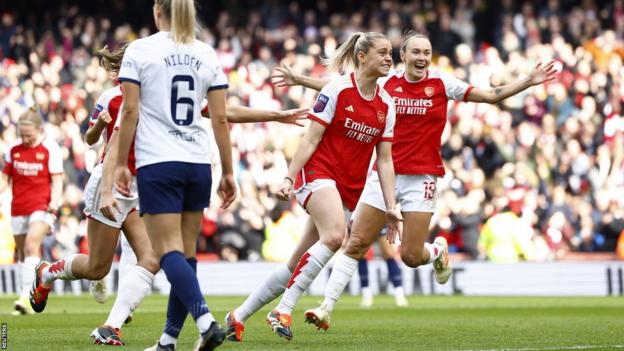 Alessia Russo celebrates after opening the scoring for Arsenal against Tottenham at Emirates Stadium