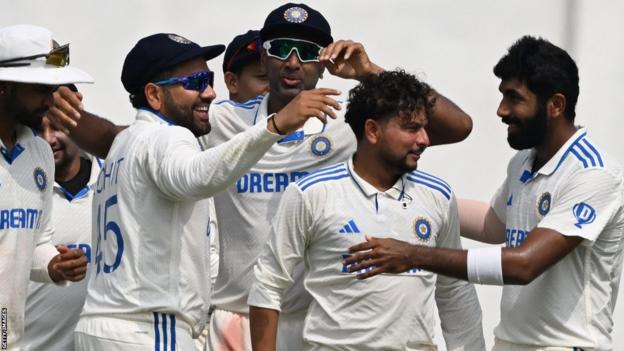 India players celebrate a wicket