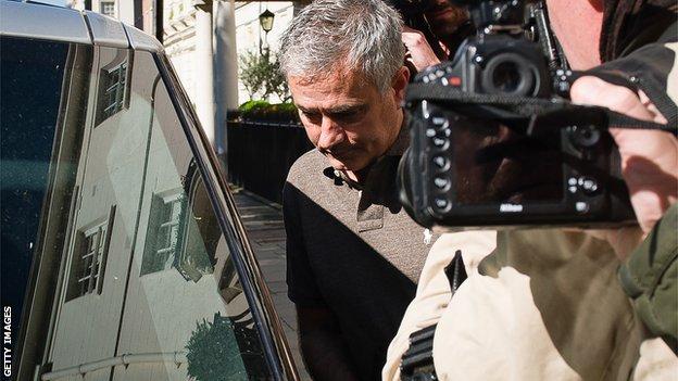 Mourinho was surrounded by media outside his London home