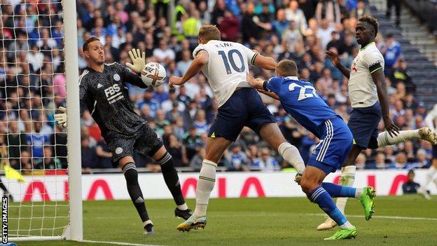 Harry Kane scores for Tottenham against Leicester.