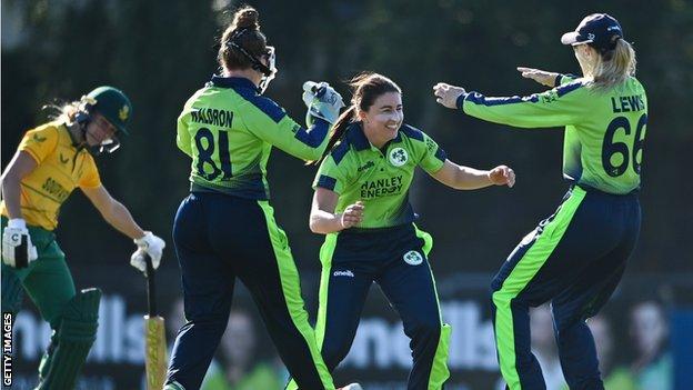 Ireland bowler Arlene Kelly celebrates taking her first international wicket
