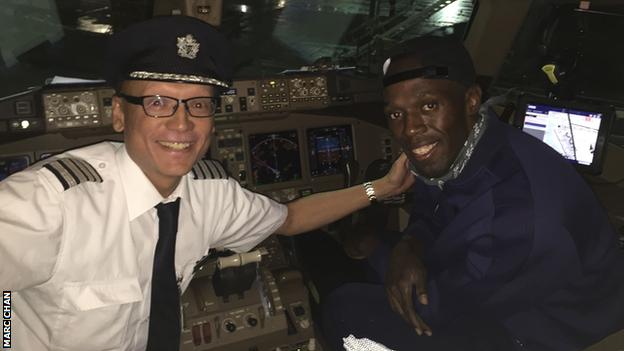 Pilot Marc Chan and Usain Bolt