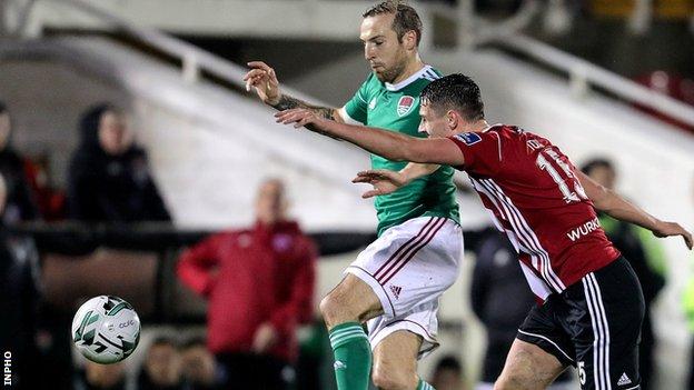 Cork striker Karl Sheppard and Candystripes defender Eoin Toal in a race for the ball